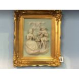 Pair of gilt framed cameo relief panels