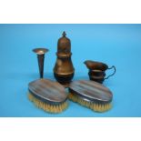 A silver sugar sifter and a small silver cream jug