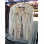 Cream fur coat