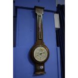 A walnut cased barometer by Short and Mason, London