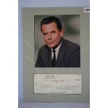 Glen Ford, signed personal cheque, mounted