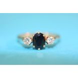 A 9ct gold diamond two stone ring with central sap