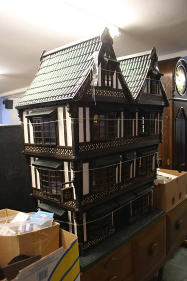 A large dolls house 'The Manor Hotel' and accessor