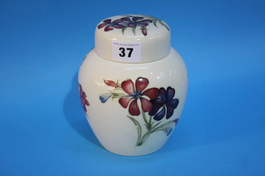 A Moorcroft floral ginger jar and lid