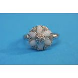 A 9ct white gold pearl and diamond set cluster rin