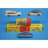 A boxed Dinky 142 'Jaguar Mark X', a boxed Dinky 198 'Rolls Royce Phantom V' and a 263 'Superior