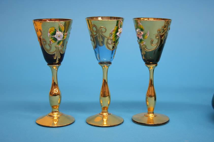 A Continental coloured glass liqueurs set comprising gilt and enamelled decanter and six small - Image 3 of 8