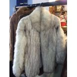 White half length fur coat