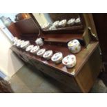 An Edwardian mahogany dressing chest and a washstand