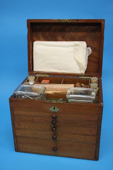 A 19th Century mahogany travelling Dentist's cabinet with rising top, opening to reveal a filled - Image 2 of 16