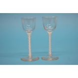 Two Victorian sherry glasses with bell shaped bowl and double opaque air twist stems, 11cm height
