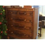 A Victorian mahogany bow front chest of drawers