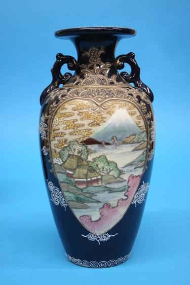 A pair of 1920/1930's Satsuma vases decorated with panels of landscapes etc. 25cm height - Image 8 of 24