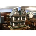 A large dolls house 'The Tudor Arms'