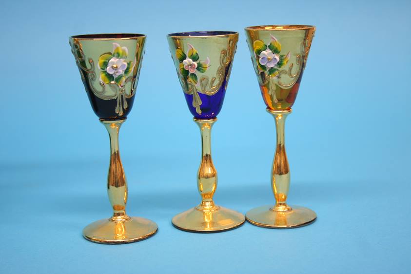 A Continental coloured glass liqueurs set comprising gilt and enamelled decanter and six small - Image 2 of 8