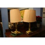 Pair of brass Corinthian column table lamps