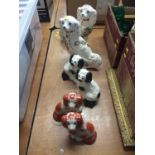 Three pairs of Staffordshire style dogs
