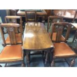 An oak gateleg table and four chairs