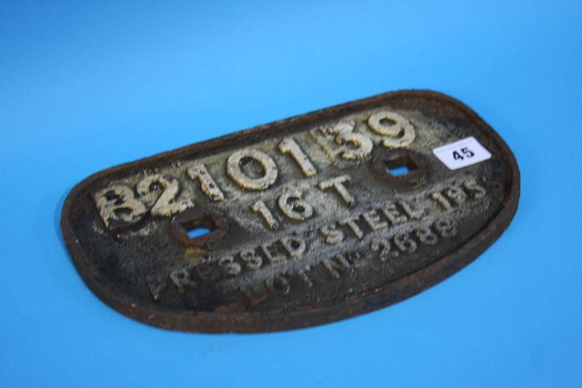 A cast iron wagon plate