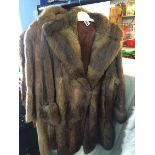 Three quarter length fur coat