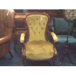 A mahogany armchair, upholstered in lime green vel