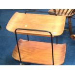 A 1950's teak drinks trolley