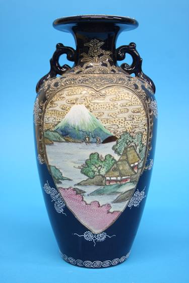 A pair of 1920/1930's Satsuma vases decorated with panels of landscapes etc. 25cm height - Image 3 of 24