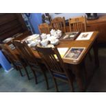 An oak Refectory table and six chairs