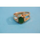 A 14ct gold emerald reverse ring, stamped 585