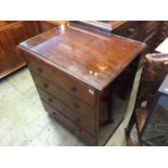 A mahogany four drawer chest of drawers