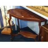 An Edwardian mahogany occasional table