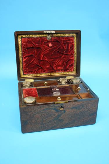 A Victorian Rosewood work box, opening to reveal a fitted interior, with single drawer to the