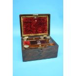 A Victorian Rosewood work box, opening to reveal a fitted interior, with single drawer to the