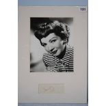 Claudette Colbert mounted signature with black and white photograph