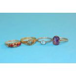 An 18ct gold ring, a 15ct gold ring and two 9ct go