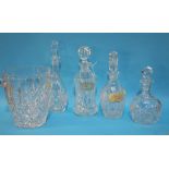 Four cut glass decanters and an ice bucket
