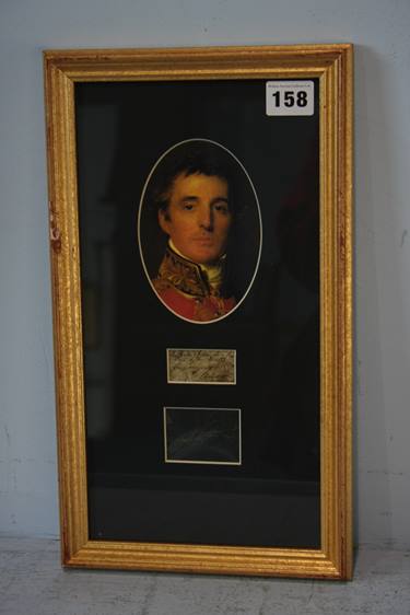 The Duke of Wellington's strands of hair, framed with picture etc.