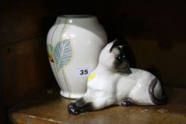 Beswick Siamese cat and a vase
