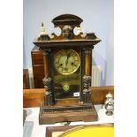 A walnut mantle clock