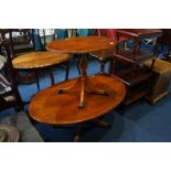 Two yew oval occasional tables