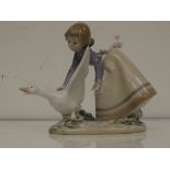 Lladro figure of a girl and a goose 16cm high