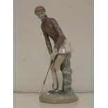 Lladro figure of a lady golfer 29cm high