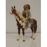 A Beswick figure of a native American Indian on a
