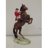 Beswick huntsman on a rearing horse, stamped and i