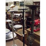 Three wrought iron candle holders