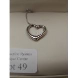 9 ct white gold chain with heart pendant.