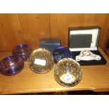 Collection of paper weights to include a clock