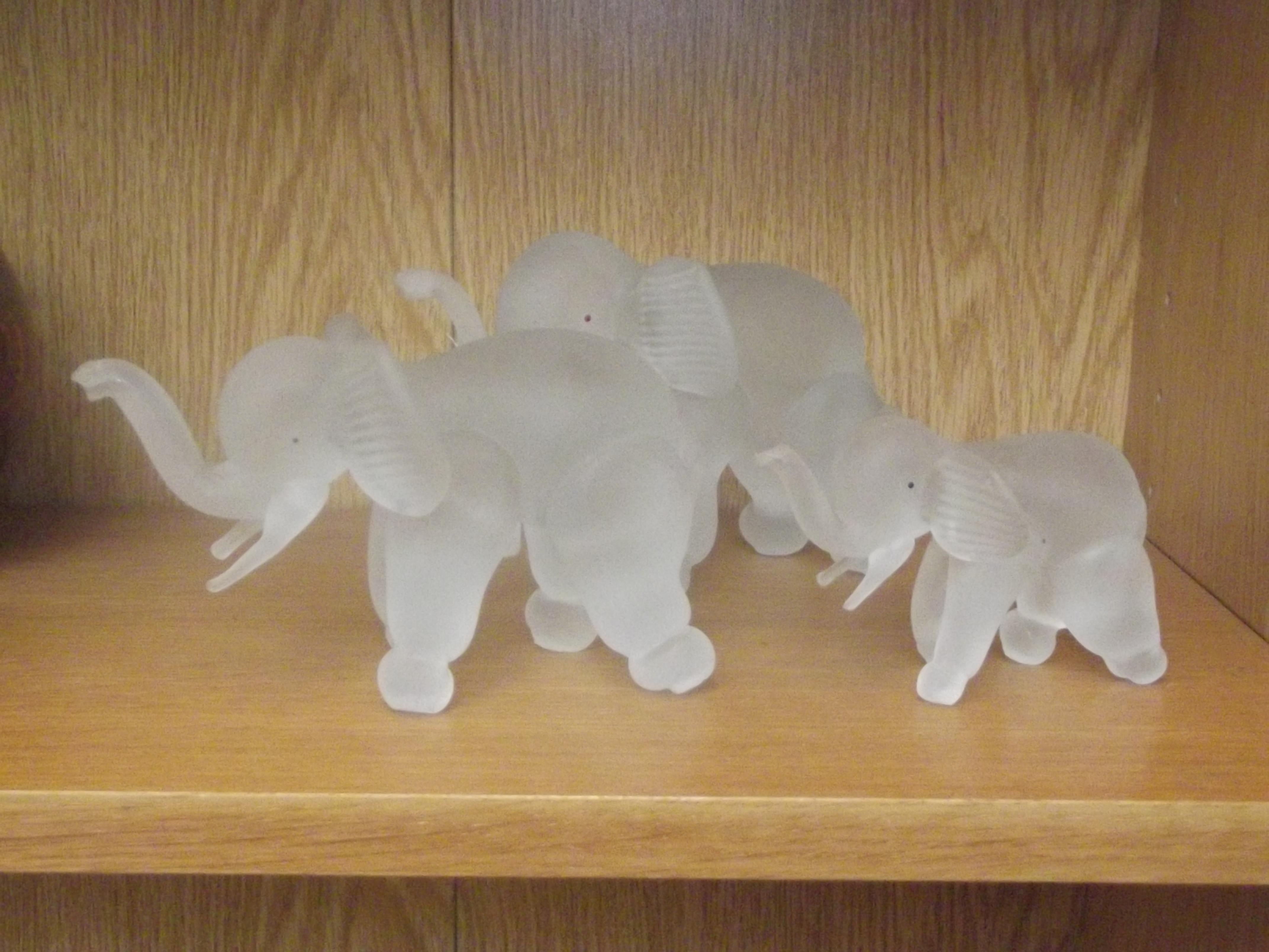 3 frosted glass elephants