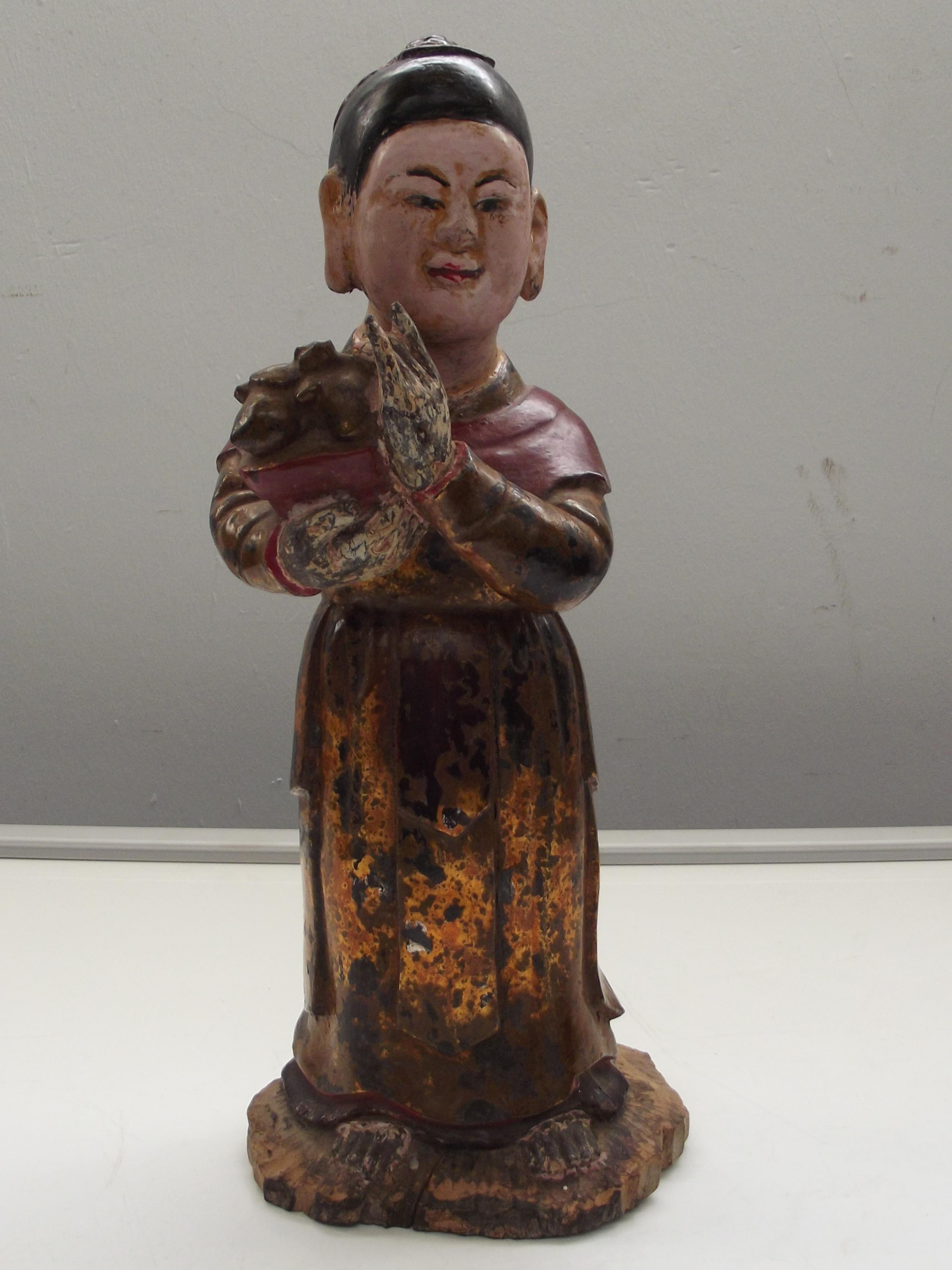 Early Chinese carved wood figure 40cm long, some p