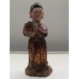 Early Chinese carved wood figure 40cm long, some p